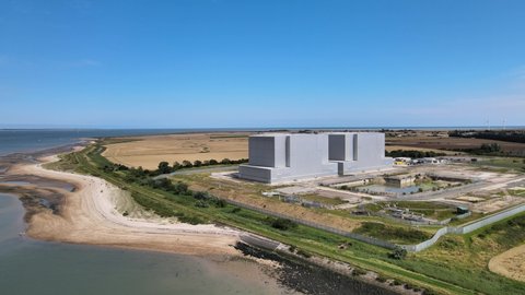 Bradwell decommissioned Nuclear Power station Essex UK Aerial footage sunny Summer day