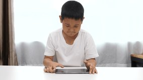 Closeup face asian children sad face play games online