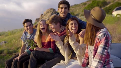 group of teenagers laughing