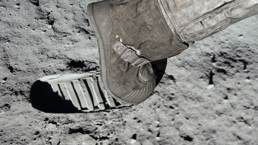 Lunar astronaut walking on the moon's surface and leaves a footprint in the lunar soil. 3d rendering. Some Elements of this video furnished by NASA. Royalty-Free Stock Footage #1077366260