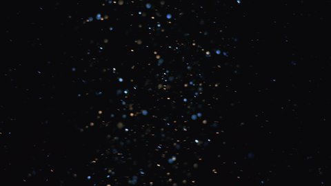 The beautiful flight of blue cosmic particles. slow motion