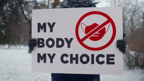 Protesting with placard My Body My Choice for pregnant women abortion rights. Women right for abortion of unwanted pregnancy support demonstration. Abortion rights for pregnant women. Strike. Activism