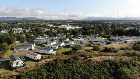 Criccieth, Wales - 9th Aug 2021: Drone footage of a UK Haven caravan park on a clear day.