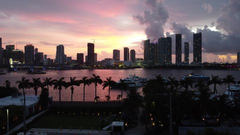 Miami downtown sunset. Beautiful aerial shot of Miami city. Drone flying over a city night lights Miami in 4K