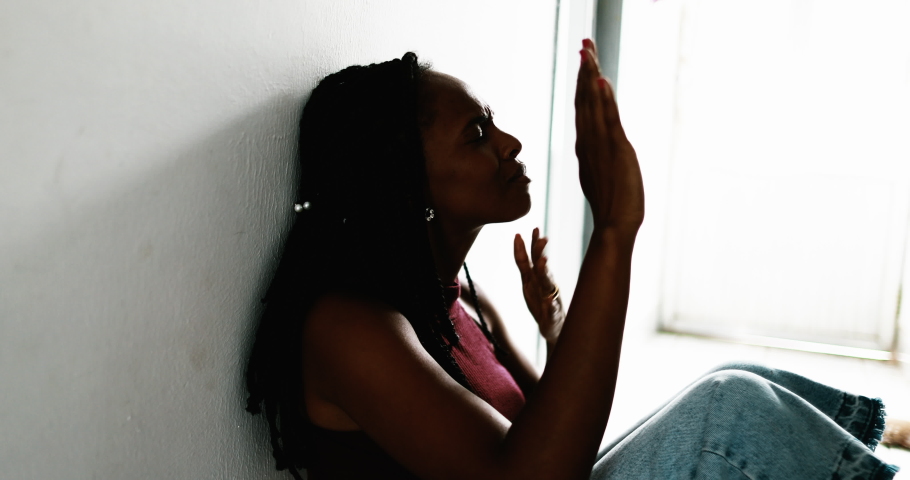 Black woman praying seeking God help | Shutterstock HD Video #1077419438