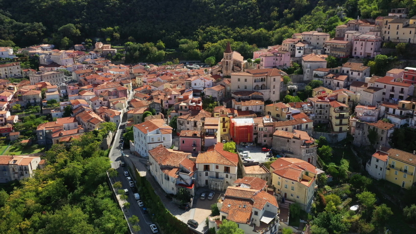 The town of Maratea at the foot of the green mountains in Europe, in Italy, in Basilicata, in the province of Potenza, in Maratea