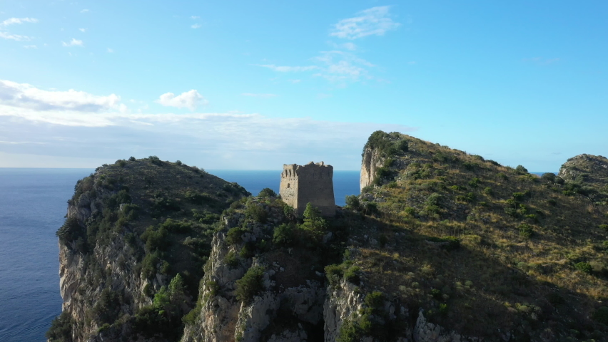 A tower on the Sorrento peninsula seen from the village of Marina del Cantone in Europe, in Italy, in Campania, in the province of Salerno