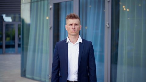 Businessman Standing Outdoor Near Office Building Handsome Caucasian Male Business Person Portrait Corporative Building Background Successful Young Adult Manager Hands crossed On Chest and Smile