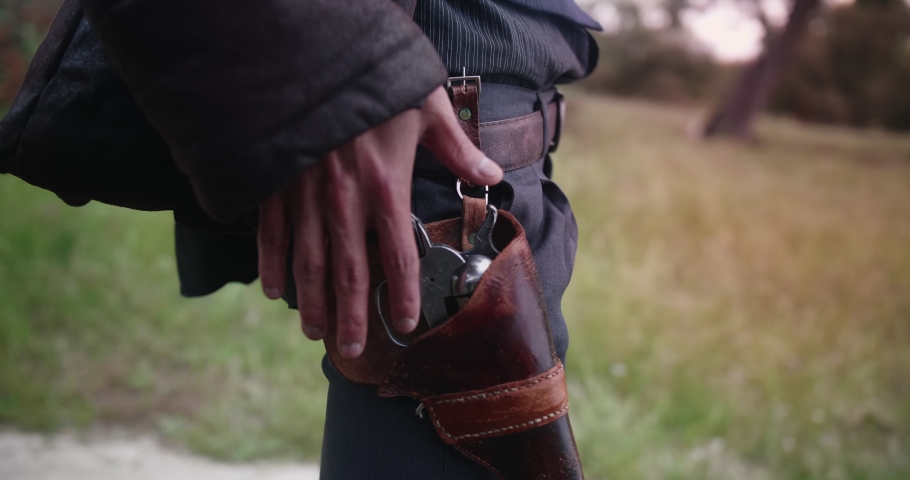 Cowboy Drawing Pistol In A Duel
