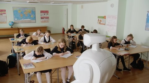 Saint-Petersburg , Saint-Petersburg , Russia - 09 28 2019: Robot teacher in a classroom in front of students