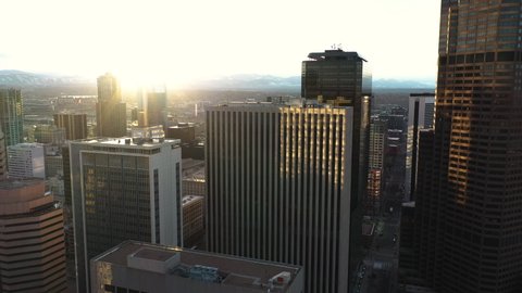 Sunset Above Downtown Denver Colorado USA, Drone Aerial View, Central Buildings and Sunlight Backlight