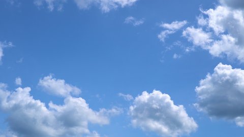 4K video Time lapse white cloud moving in blue sky background movie clip.