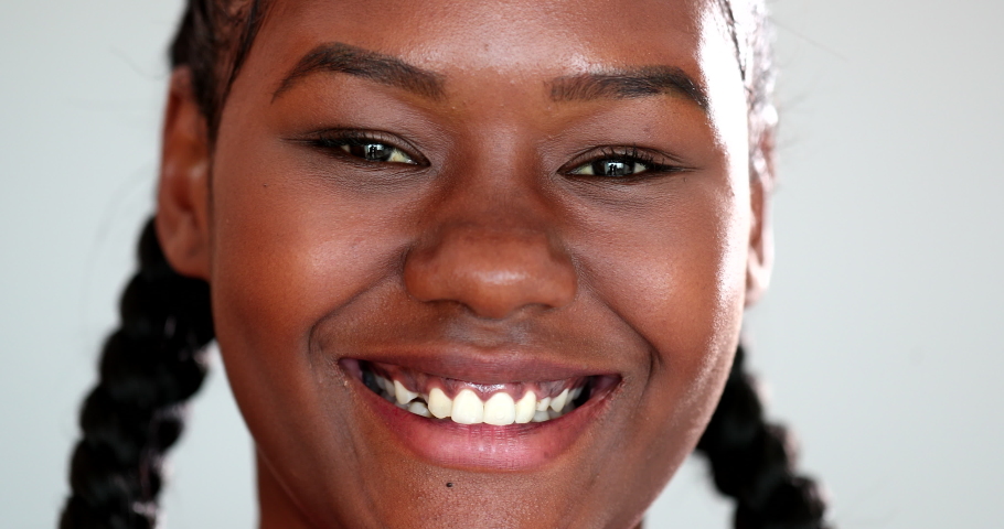 Hapy young african woman smiling