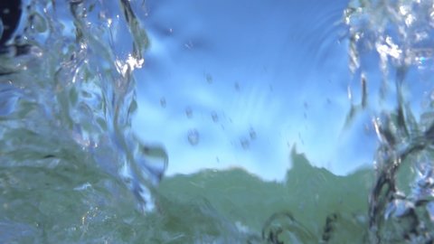 Underwater shot of plunging into the water.