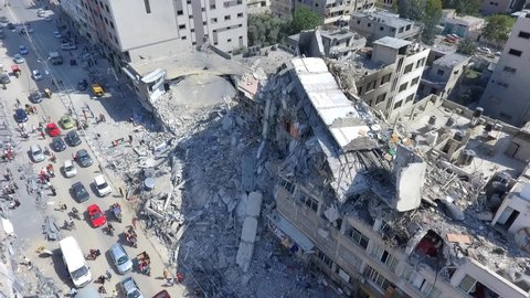 Gaza Strip, Palestinian Territory, May 21, 2021: Aerial footage captured by drone for the destroyed houses and towers by the Israeli attacks on one of the civilian neighborhoods in west Gaza