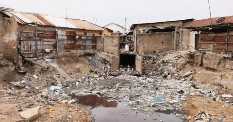 Nima Accra city environment pollution poverty neighborhood. West Africa on the Atlantic ocean. Many towns, villages communities polluted by trash, garbage and sewage.