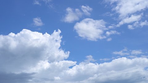4K video Time lapse white cloud moving in blue sky background movie clip.