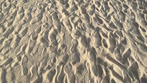 4K-Footprints on the sand beach