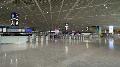 NARITA, CHIBA, JAPAN - JUL 2021 : View of Narita International Airport(Terminal 1). Normally crowded and busy, but lightly populated due to concerns over Coronavirus (COVID-19) and State of Emergency.