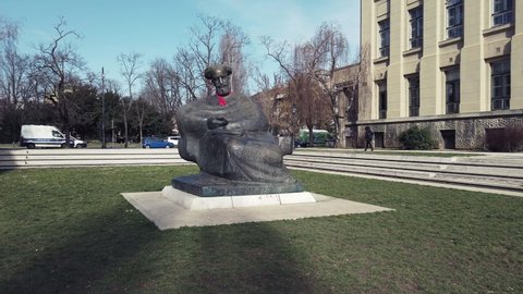 Zagreb, Croatia - 20 May, 2020: Statue of the famous Croatian writer Marko Marulic near of the old Croatian Natioinal Archives in Zagreb, Croatia