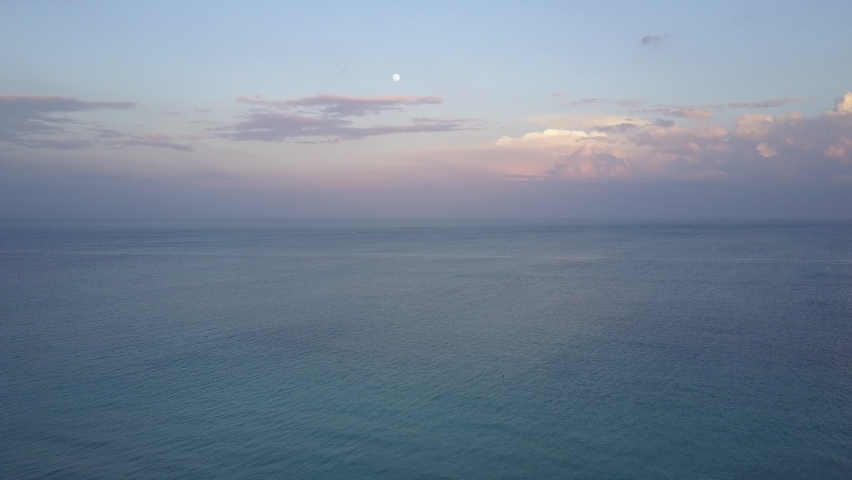 Aerial view of North Beach Miami on a beautiful, sunny day.  Vibrant colors of blue and orange seen during sunset on the beach and the ocean.