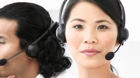 Animation of envelope over businesswoman wearing headset. global communication, business, connections, digital interface and technology concept digitally generated video.