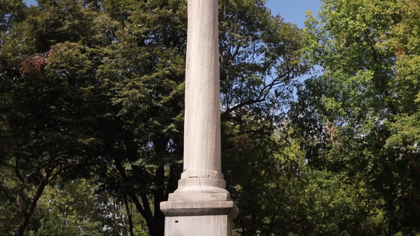 Historical architectural monument Gothic Column. Roman triumphal column. Located in a public place in Istanbul, Turkey.