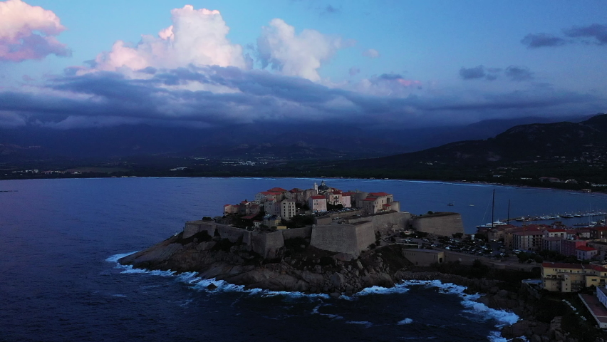 The citadel of Calvi by the Mediterranean Sea in Corsica, France and in summer.