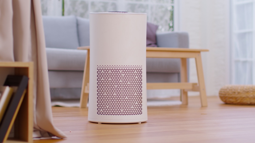 Air purifier in cozy white bedroom for filter and cleaning removing dust PM2.5 HEPA in home,for fresh air and healthy life,Air Pollution Concept Royalty-Free Stock Footage #1077586634