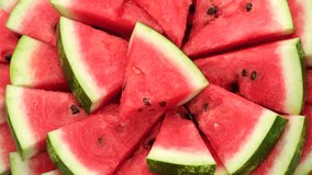 Fresh Watermelon Slices top view, rotation. 4K UHD video