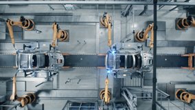 Aerial Car Factory 3D Concept: Automated Robot Arm Assembly Line Manufacturing High-Tech Green Energy Electric Vehicles. Construction, Welding Industrial Production Conveyor. Top View Time-Lapse Loop - Powered by Shutterstock - Get 15% off with code: PIKWIZARD15