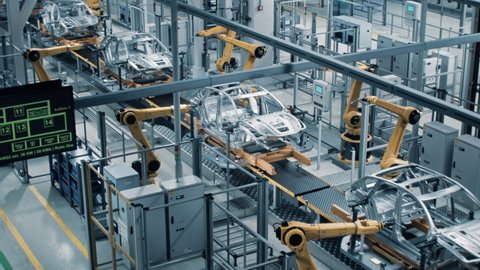 Car Factory 3D Concept: Automated Robot Arm Assembly Line Manufacturing High-Tech Green Energy Electric Vehicles. Construction, Building, Welding Industrial Production Conveyor. Elevated Wide Shot