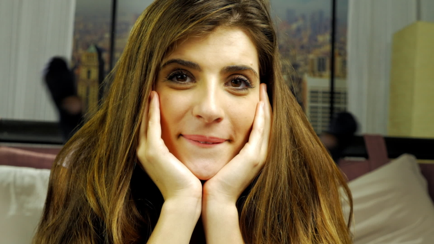 Cute fresh young woman in bed at home in the morning smiling looking camera | Shutterstock HD Video #1077631859