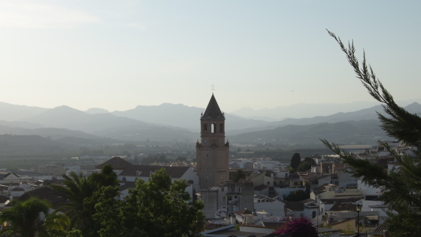 San Juan tower and Velez Malaga town at sunset
