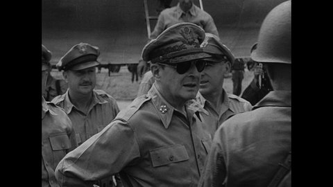 1940s: Japan. General Douglas MacArthur greets men and poses for photo. Sailors stand on deck of ship. Officials perform ceremony.