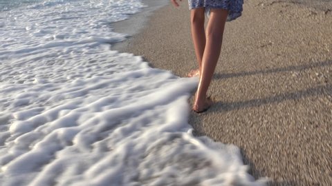 Child Feet Walking, Playing on Beach at Sunset, Kid Footsteps in Sea Waves, Footprints on Send on Seashore, Summer Vacation