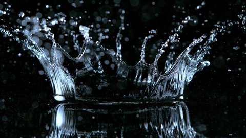 Super Slow Motion Shot of Water Crown Splash at 1000fps Isolated on Black Background.