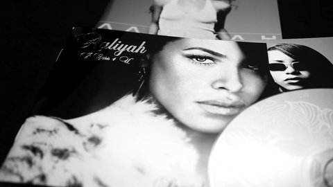Rome, Italy - March 26, 2019: CDs and artwork of the American singer, actress, and model Aaliyah. were killed in a plane crash in the Bahamas after filming a music video