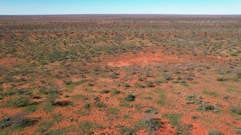 Outback Australia aerial wide shot picturesque red sand desert scenic landscape