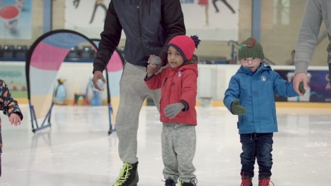 NOTTINGHAM, UK - MAY 10, 2018: Children skating on an ice rink