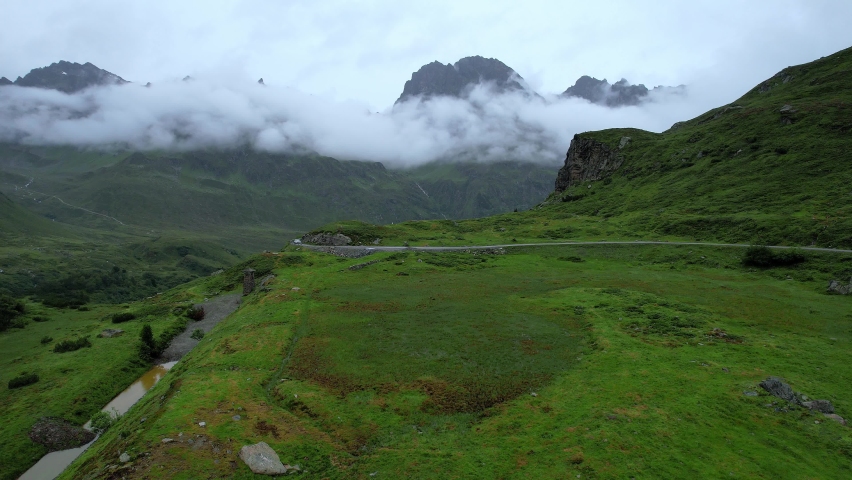 Amazing scenery and typical landscape in Austria - the Austrian Alps from above - travel photography by drone