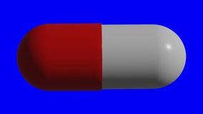 Loopable W-Alpha: Rotating red and white capsule pill isolated on blue screen background.