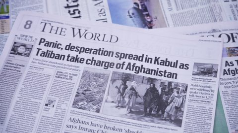  Dehradun, Uttarakhand India August 15, 2021. Taliban Afghanistan war paper news 2021 . High quality 4k footage