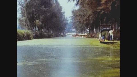 MEXICO CITY, MEXICO OCTOBER 1974: Colorful boats of Xochimilco in 70's