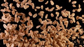 Super Slow Motion Shot of Flying Roasted Peanuts. Filmed on High Speed Cinematic camera at 1000 fps. - Powered by Shutterstock - Get 15% off with code: PIKWIZARD15