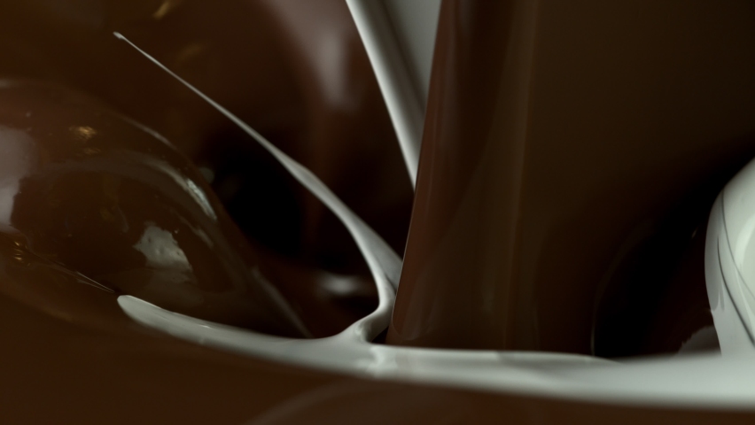 Super Slow Motion Shot of Pouring Melted Chocolate at 1000 fps. Royalty-Free Stock Footage #1077733727
