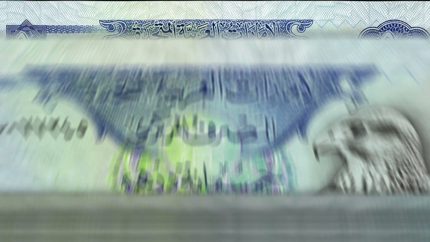 Arab Emirates Dirhams money counting machine with banknotes. Quick 500 AED Dubai currency note down rotation. Business and economy concept loopable and seamless background. Royalty-Free Stock Footage #1077760340