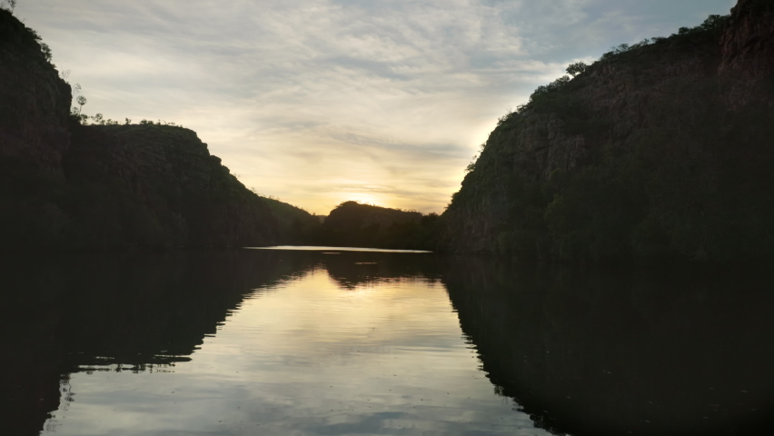 a sunrise cruise in nitmiluk gorge, also known as katherine gorge at nitmiluk national park in the northern territory Royalty-Free Stock Footage #1077768989