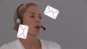 Animation of emails icons over woman wearing phone headset. global business, digital interface and technology concept digitally generated video.