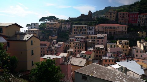 Riomaggiore in 5 Terre, beautiful view over the roofs of famous tourist destination at the Mediterranean Sea